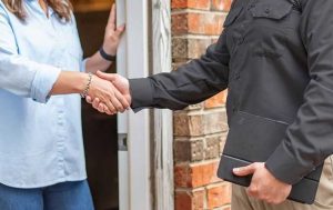 tech greeting homeowner photo